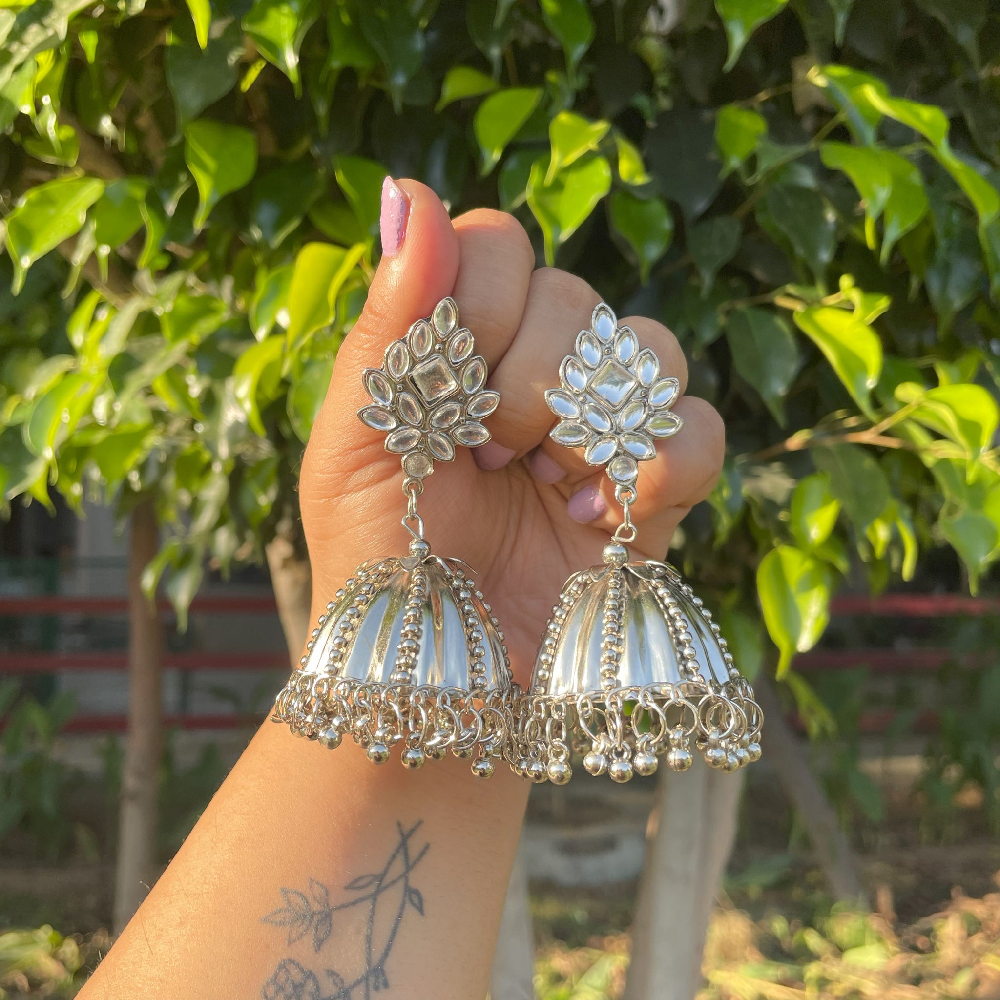 Floral jhumkas on sale