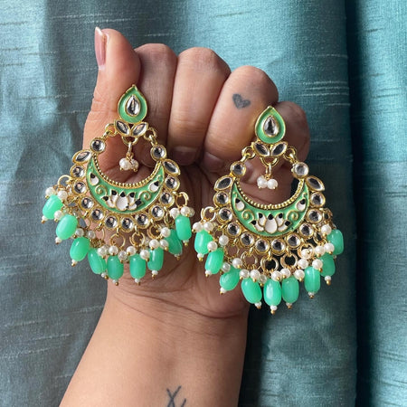 Traditional party wear long jhumka earrings light green color for women