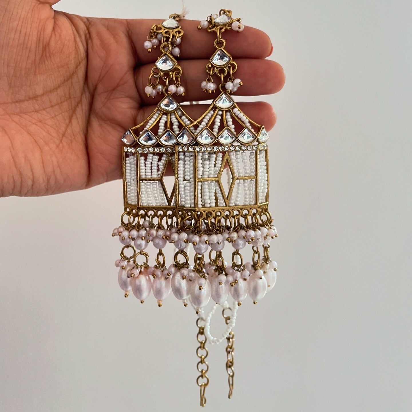 Ethnic white beads earrings with Ear chain Jewels and Stones India